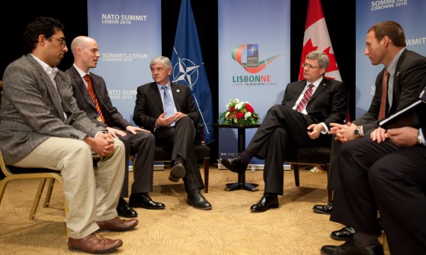 Prime Minister Stephen Harper meets with Sean Palter and Aly Verjee, Canadian paritcipants in the Young Atlanticists Program, before the start of the NATO Summit in Lisbon, Portugal November 19, 2010. PMO photo by Jason Ransom