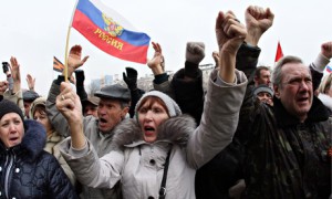 Pro-Russian activists wave a Russian flag at a rally in Donetsk, eastern Ukraine.