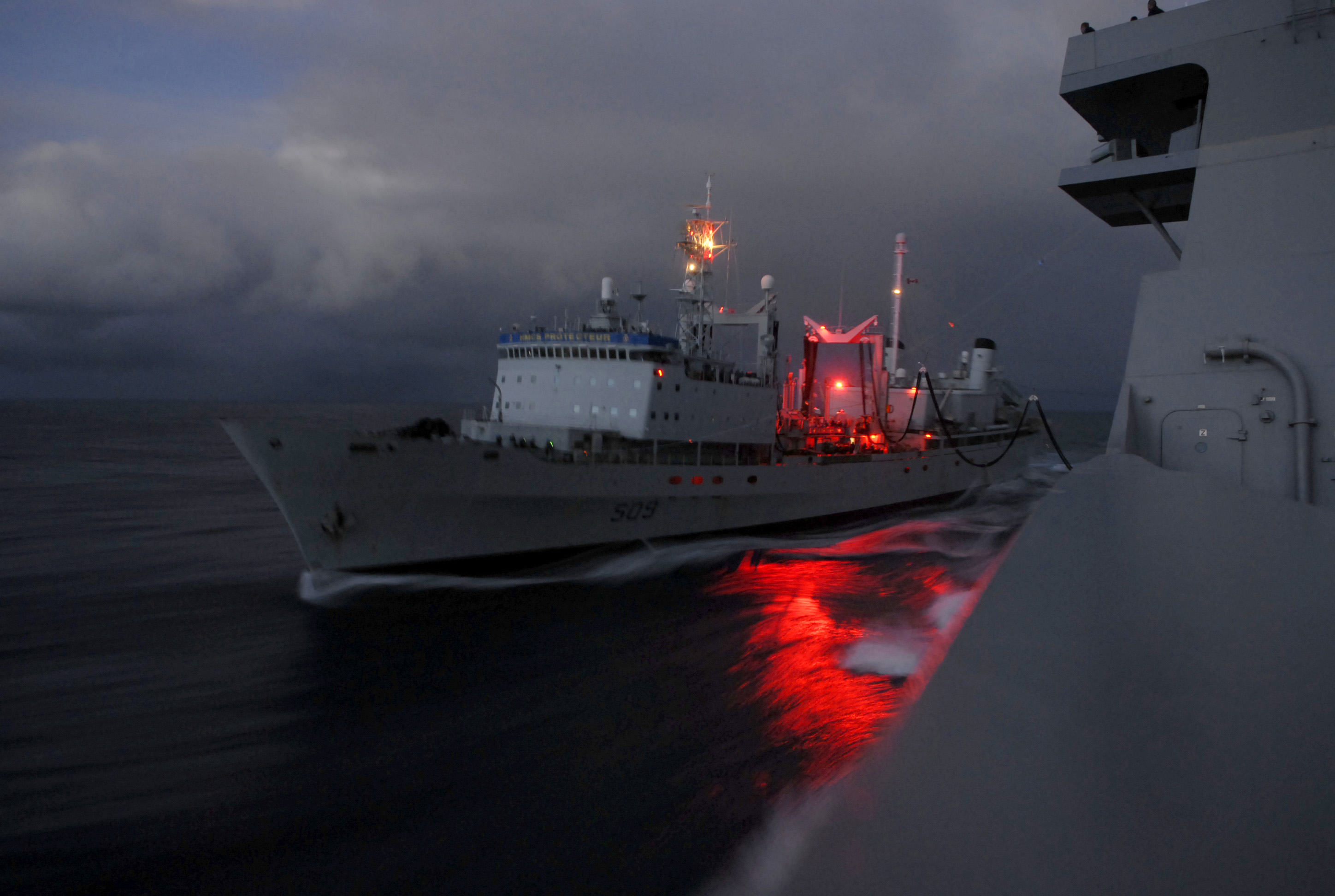 HMCS Protecteur refuelling American vessel