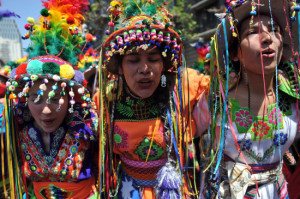 Mapuche girls marching at a political rally